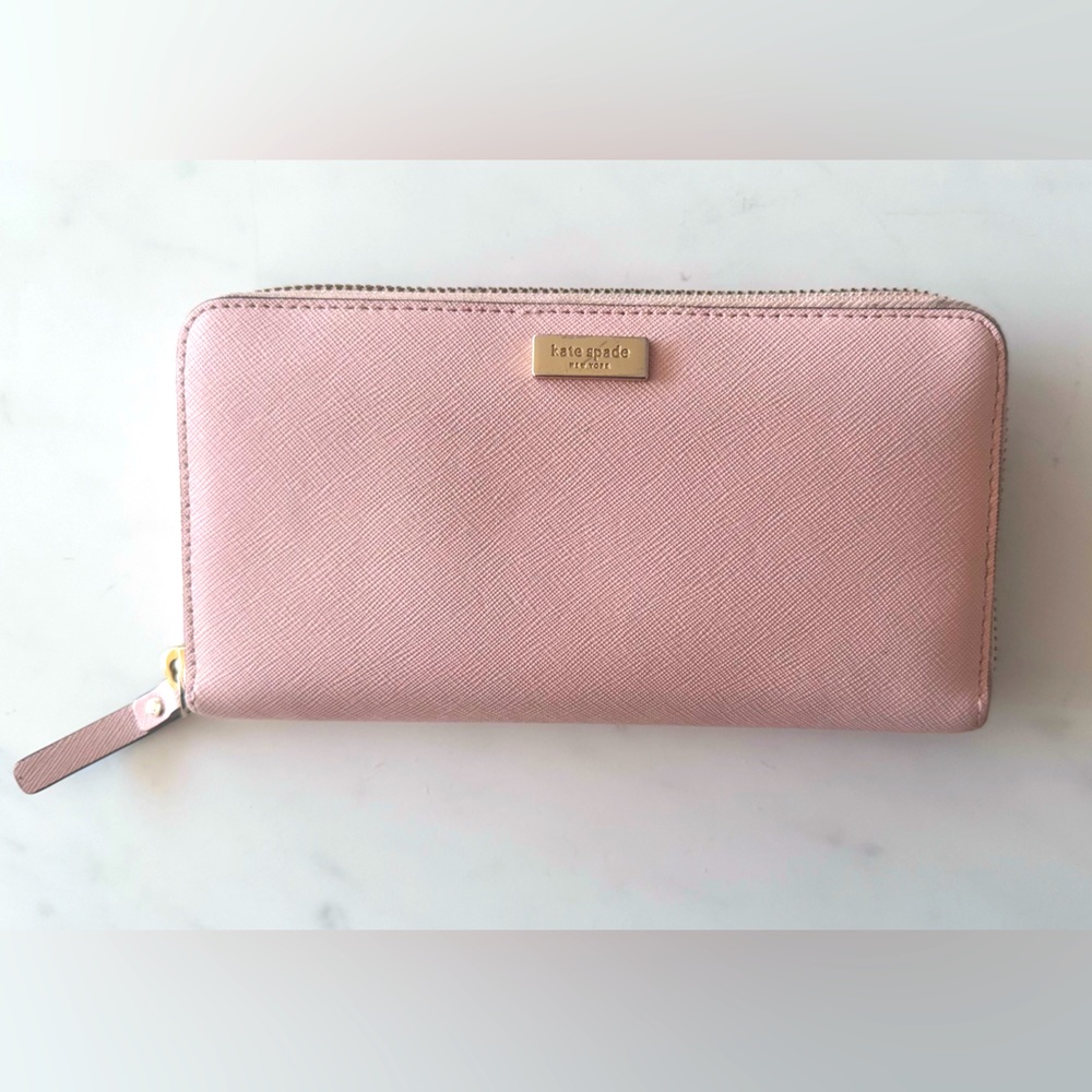 Pink zip up Kate spade wallet with credit card and coin slot